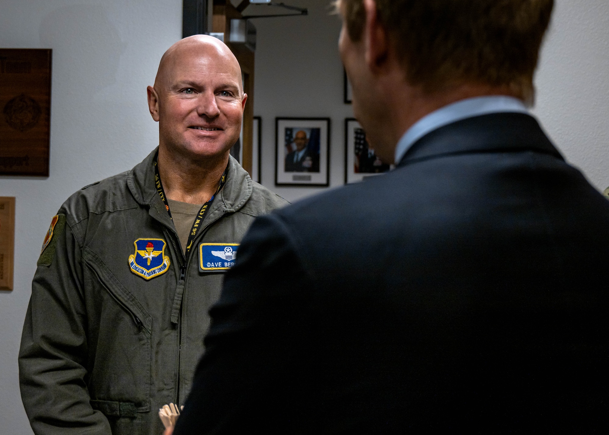 U.S. Air Force Brig. Gen. David Berkland (left), 56th Fighter Wing commander, speaks to Frederic Bernard (right), Belgian Ambassador to the United States