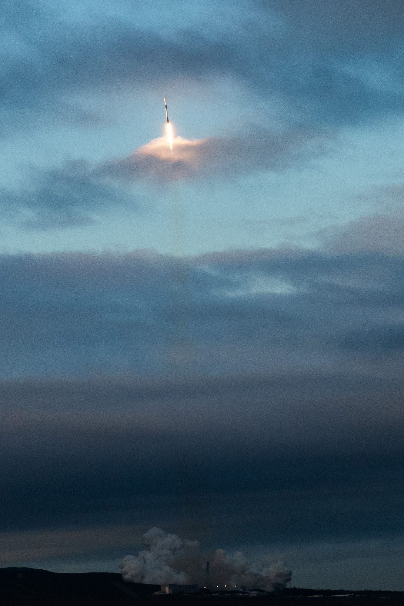 a rocket launches through the sky