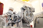 U.S. Naval Research Laboratory (NRL) Senior Electrical Technician, Renzo Benites completes final grounding of the Compact Coronagraph-2 (CCOR-2) after integration on National Oceanic and Atmospheric Administration’s (NOAA), Space Weather Follow On-Lagrange 1 (SWFO-L1) satellite.
