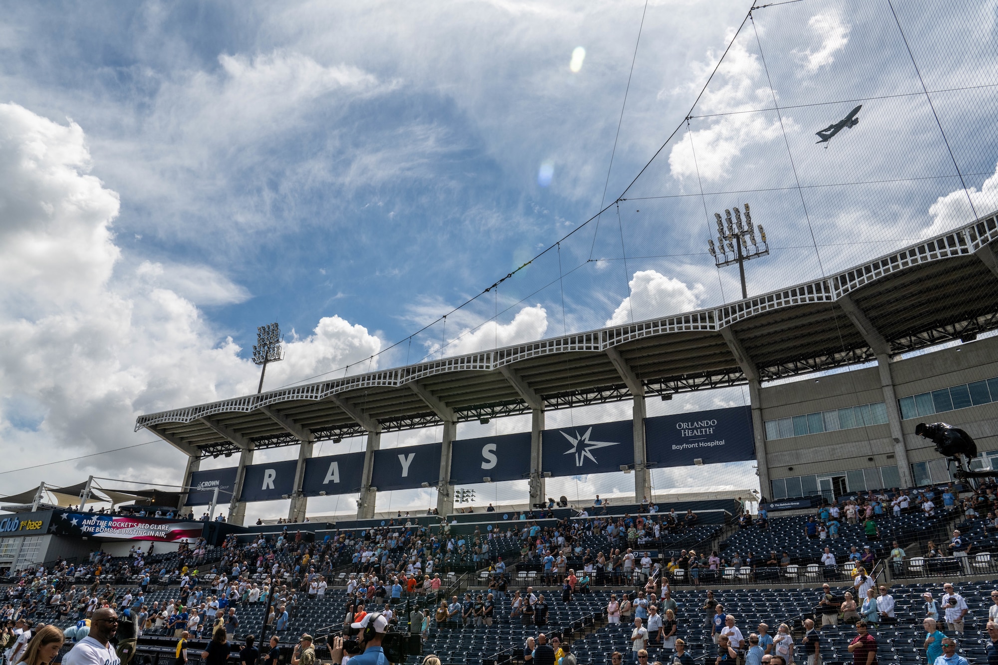 A U.S. Air Force KC-135 Stratotanker assigned to the 6th Air Refueling Wing, performs a flyover during the Tampa Bay Rays baseball game in Tampa, Florida, Sept. 18, 2025. During the game, Airmen assigned to the 6th ARW were recognized for their service and contributions to the community. (U.S. Air Force photo by Staff Sgt. Christopher Tam)