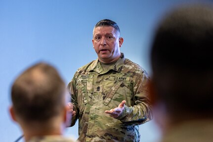 Sgt. Maj. Jaime Perez, U.S. Army Financial Management Command Reserve Component finance and comptroller senior enlisted advisor, briefs 45th Finance Center Soldiers about the Army Reserve’s and National Guard’s role in finance operations during a staff exercise in the Mark Sullivan Auditorium at the Maj. Gen. Emmett J. Bean Federal Center in Indianapolis Sept. 18, 2025. The four-day exercise brought together elements from the 45th FC’s headquarters and three geographically separated teams to assess the unit’s operational capacity and limitations while enhancing its future operational reach for large scale and multidomain operations. (U.S. Army photo by Mark R. W. Orders-Woempner)