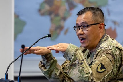 Sgt. Maj. Rodani Tan, 45th Finance Center senior enlisted advisor, makes remarks during a staff exercise in the Mark Sullivan Auditorium at the Maj. Gen. Emmett J. Bean Federal Center in Indianapolis Sept. 18, 2025. The four-day exercise brought together elements from the 45th FC’s headquarters and three geographically separated teams to assess the unit’s operational capacity and limitations while enhancing its future operational reach for large scale and multidomain operations. (U.S. Army photo by Mark R. W. Orders-Woempner)