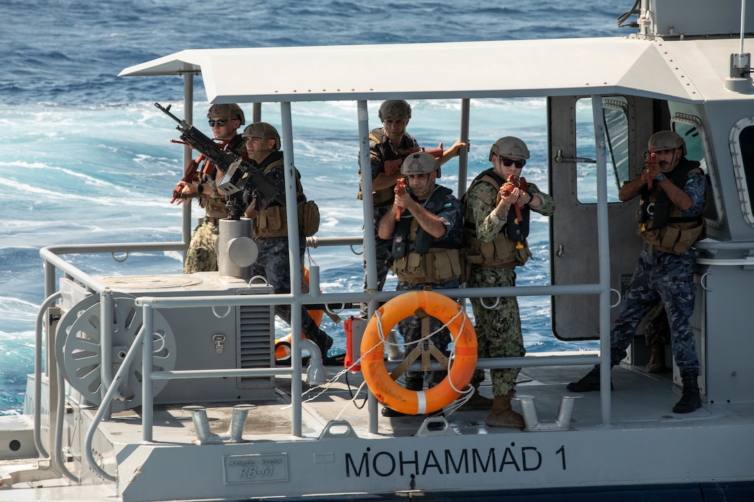 U.S. CENTRAL COMMAND AREA OF RESPONSIBILITY (Sept. 17, 2025) U.S. Coast Guardsmen assigned to U.S. Naval Forces Central Command’s Maritime Engagement Team and members of the Jordanian Armed Forces participate in a simulated visit, board, search, and seizure (VBSS) operation aboard a Royal Jordanian Naval Forces vessel in the Gulf of Aqaba, Sept. 17, 2025, during exercise INFINITE DEFENDER 25. INFINITE DEFENDER 25 is an annual, bilateral explosive ordnance disposal and maritime security exercise between U.S. 5th Fleet and the Royal Jordanian Navy to enhance mutual capabilities and interoperability. (U.S. Army photo by Sgt. Hans Williams)