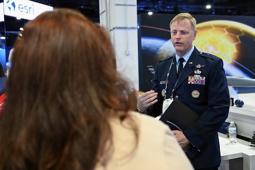 Maj. Gen. Luke Cropsey talks to industry members during the Air, Space and Cyber Conference, here, Sept. 23, 2025. The conference is an opportunity for Department of the Air Force senior leaders to meet and address Airmen, Guardians, allies, partners and industry leaders. Cropsey is the Department of the Air Force Program Executive Office for Command, Control, Communications and Battle Management’s program executive officer. (Official Air Force Photo by Richard Blumenstein).