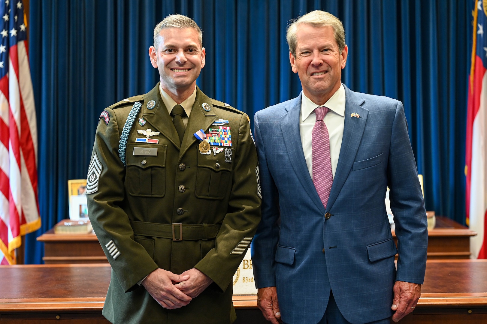 Command Sgt. Maj. Jon A. Ring stands with Georgia Gov. Brian Kemp during a Soldier’s Medal ceremony at the Georgia State Capitol in Atlanta, Sept. 22, 2025.