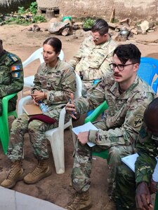 SETAF-AF civil affairs NCO translates French for his team in West Africa