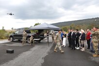 A delegation of more than 20 Lithuanian defense, diplomatic and business officials visited the Unmanned Aircraft Systems facility at Fort Indiantown Gap, Pennsylvania, Sept. 23, 2025, as part of a five-day mission in the United States. Loreta Maskolioviene, Lithuania’s vice-minister of national defense, led the delegation which was received by U.S. Army Maj. Gen. John R. Pippy, Pennsylvania’s adjutant general, and other Guard leaders. (U.S. Army National Guard photo by Zane Craig)
