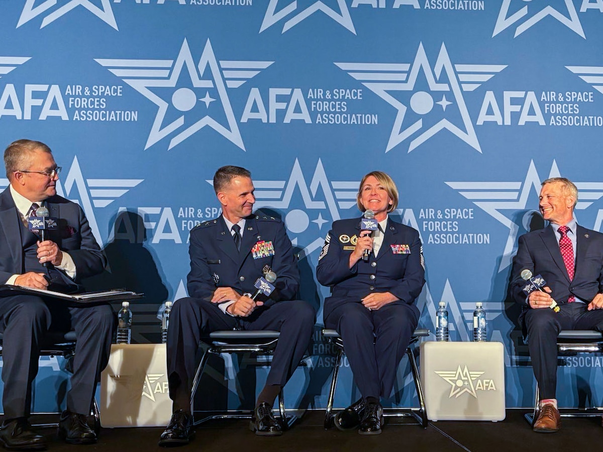 Chief Master Sgt. Katie McCool, Pacific Air Forces command chief, answers questions during a panel at Air and Space Force Association’s Warfare Symposium on Sept. 23, 2025. McCool highlighted that while the Air Force prepares for future operational challenges, a parallel focus on family readiness is necessary to ensure that families and communities connected to our units are as well prepared as service members. (U.S. Air Force photo by Capt. Ethan Harris)