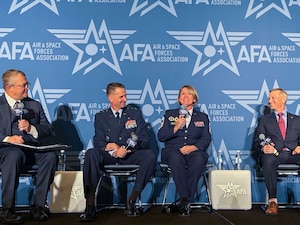 Chief Master Sgt. Katie McCool, Pacific Air Forces command chief, answers questions during a panel at Air and Space Force Association’s Warfare Symposium on Sept. 23, 2025. McCool highlighted that while the Air Force prepares for future operational challenges, a parallel focus on family readiness is necessary to ensure that families and communities connected to our units are as well prepared as service members. (U.S. Air Force photo by Capt. Ethan Harris)