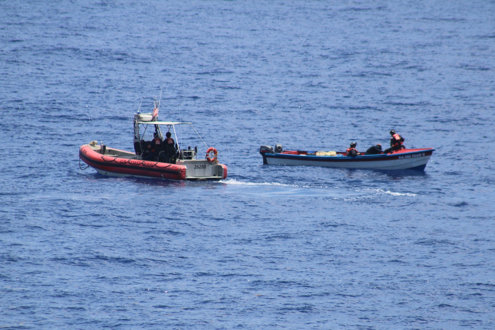 U.S. Coast Guard Cutter Diligence’s (WMEC 616) crew interdicts a suspicious go-fast vessel approximately 136 miles southwest of Negril, Jamaica, Aug. 7, 2025. The vessel was detected and boarded by Diligence’s crew, resulting in the seizure of 1,500 pounds of marijuana. (U.S. Coast Guard photo)