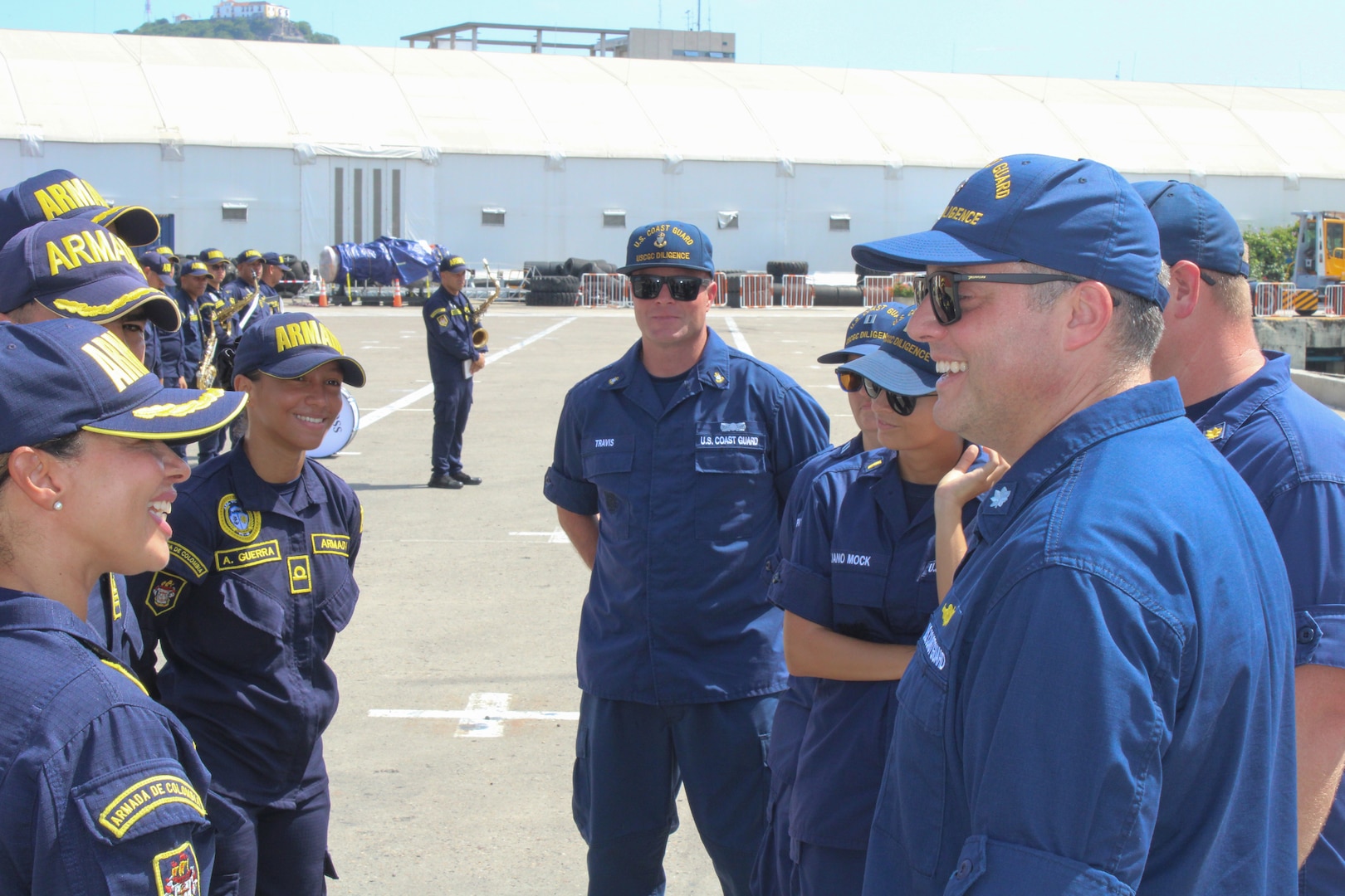 Coast Guard Cutter Diligence (WMEC 616) Commanding Officer Cmdr. Colin McKee, forward-right, and Diligence crew members are greeted by Colombian Navy (Armada Nacional de la República de Colombia) personnel at the pier in Cartagena, Colombia, Sept. 14, 2025. Diligence’s crew conducted a 57-day patrol in the Caribbean Sea to counter illicit drug smuggling in the region. (U.S. Coast Guard photo by Ensign Jason Ruggieri)