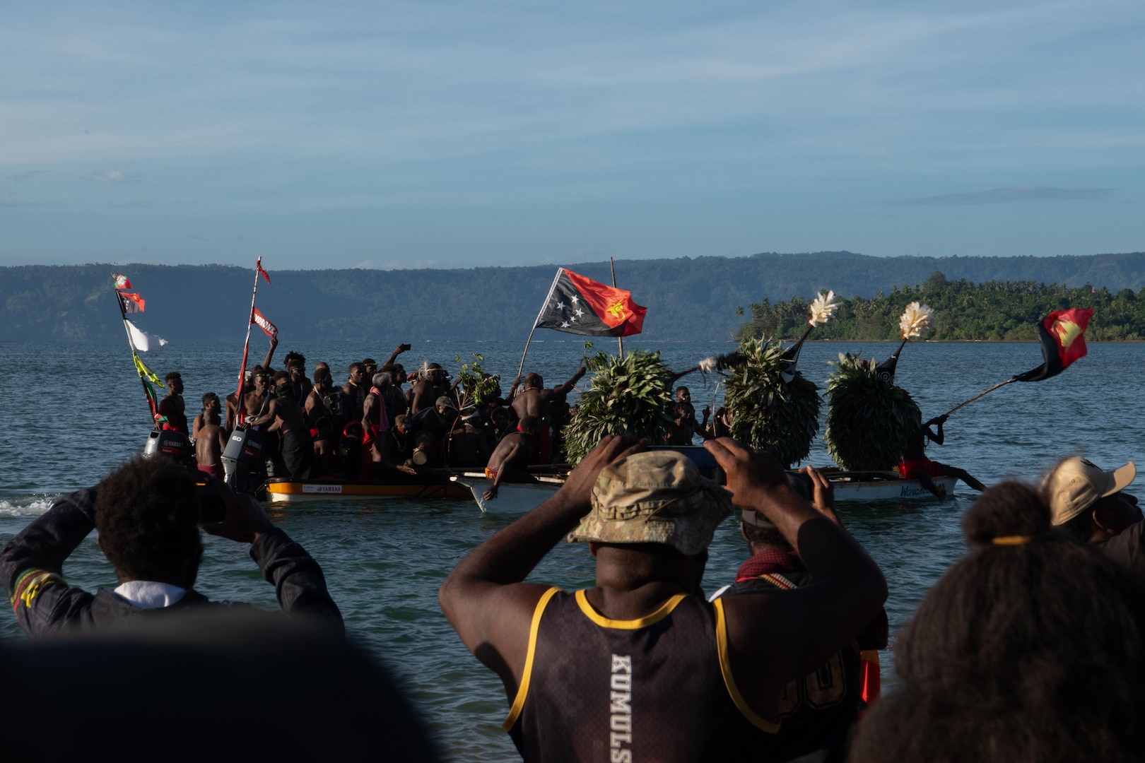 Members of the Tolai people arrive to shore as they perform a Kinavai Dawn Dance celebrating Papua New Guinea's 50th Independence Day on Sept. 16, 2025.