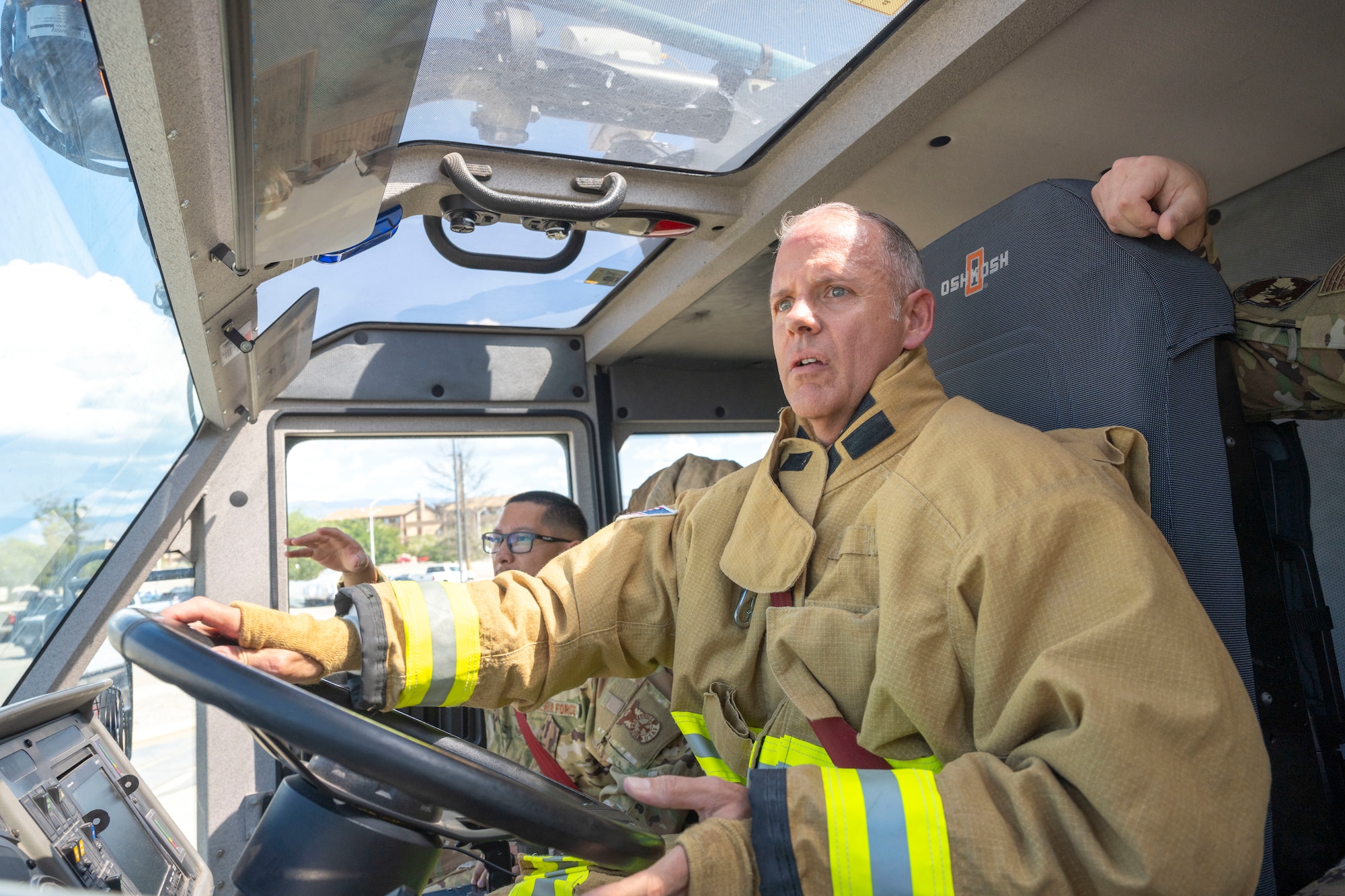 U.S. Air Force Chief Master Sgt. William Ford, 49th Wing command chief, drives Engine 6 during the Hands-On Holloman event at Holloman Air Force Base, New Mexico, Sept. 10, 2025.