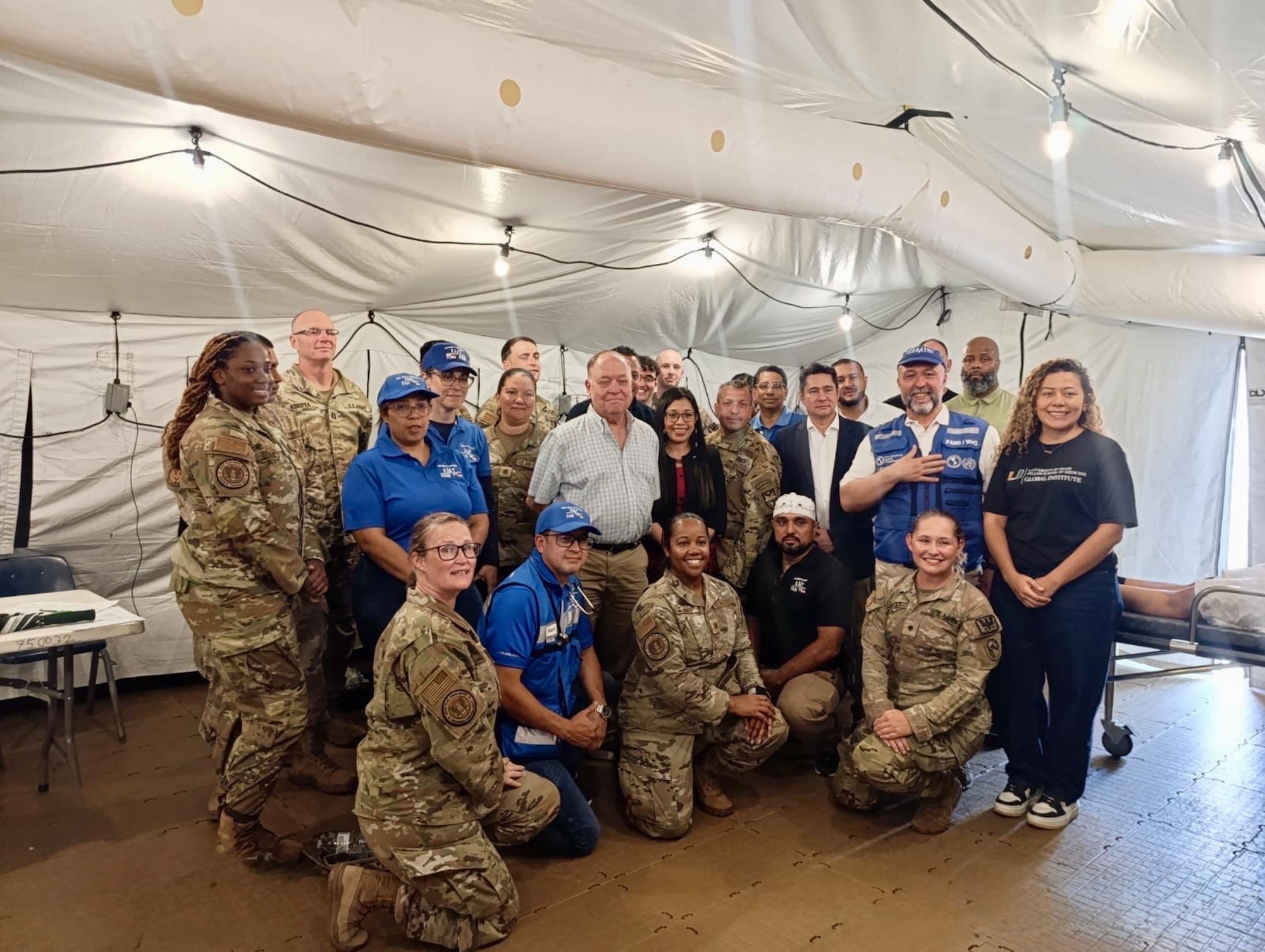Members from the U.S. and Panamanian emergency response teams gather together for a group photo at the end of the week long mass casualty training exercise.