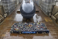 241213-N-GD259-1038 Bremerton, Wash. (Dec. 13, 2024) – Crewmembers assigned to the ballistic missile submarine USS Pennsylvania (SSBN 735) pose for a photo while the ship is in dry dock at Puget Sound Naval Shipyard and Intermediate Maintenance Facility. Pennsylvania won the 2024 Retention Excellence Award and Best-In-Class distinction for Pacific Fleet SSBNs. Commander, Submarine Group (SUBGRU) 9 exercises administrative and operational control authority for assigned submarine commands and units in the Pacific Northwest providing oversight for shipboard training, personnel, supply and material readiness of SSBNs and their crews. SUBGRU-9 is also responsible for nuclear submarines undergoing conversion or overhaul at Puget Sound Naval Shipyard in Bremerton, Washington. SUBGRU-9’s subordinate commands include Submarine Readiness Squadron 31, Submarine Squadrons 17 and 19, eight SSBNs, two SSGNs, and four SSNs homeported in the Pacific Northwest. (U.S. Navy Photo by Wendy Hallmark)