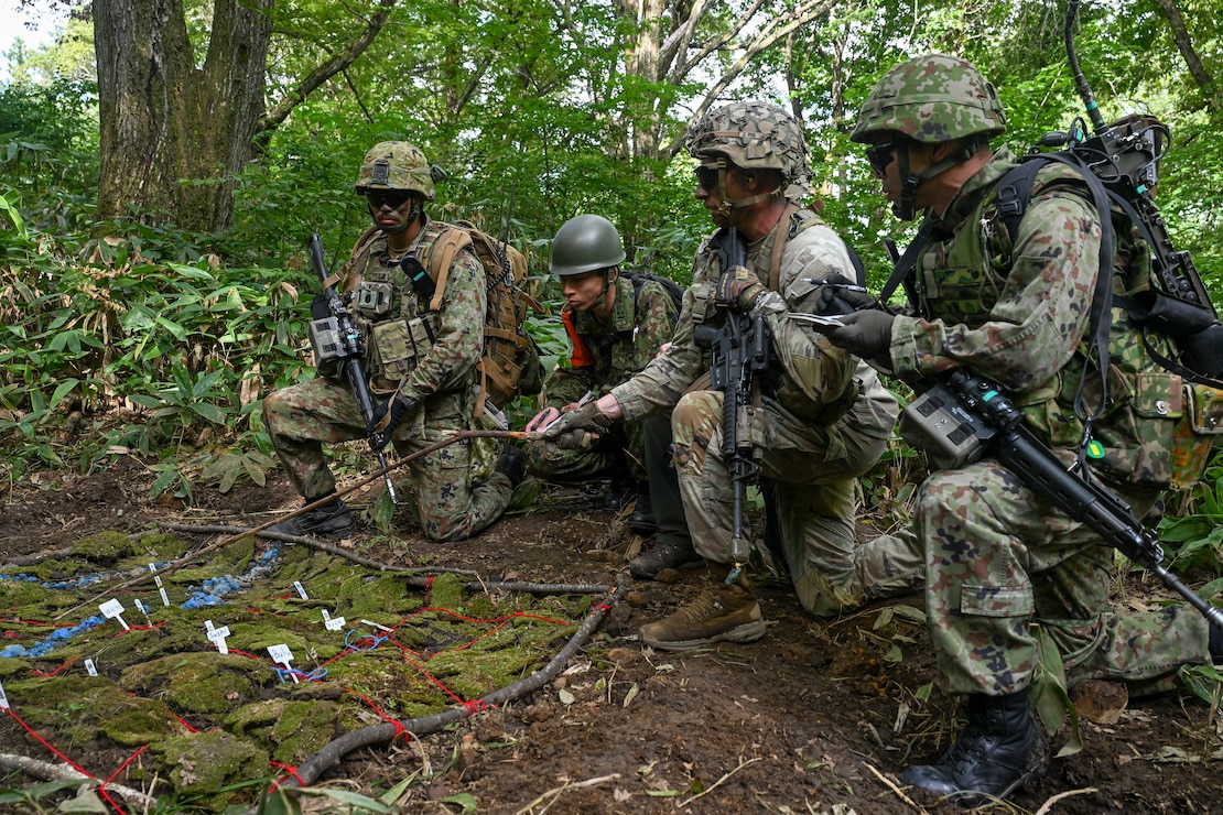 U.S. Army Missouri National Guard Soldiers assigned to the 1st Battalion, 138th Infantry Regiment and Japan Ground Self Defense Force personnel conduct tactical maneuver training as part of Orient Shield 25 at Sekiyama Training Area, Niigata, Japan, Sept. 19, 2025.