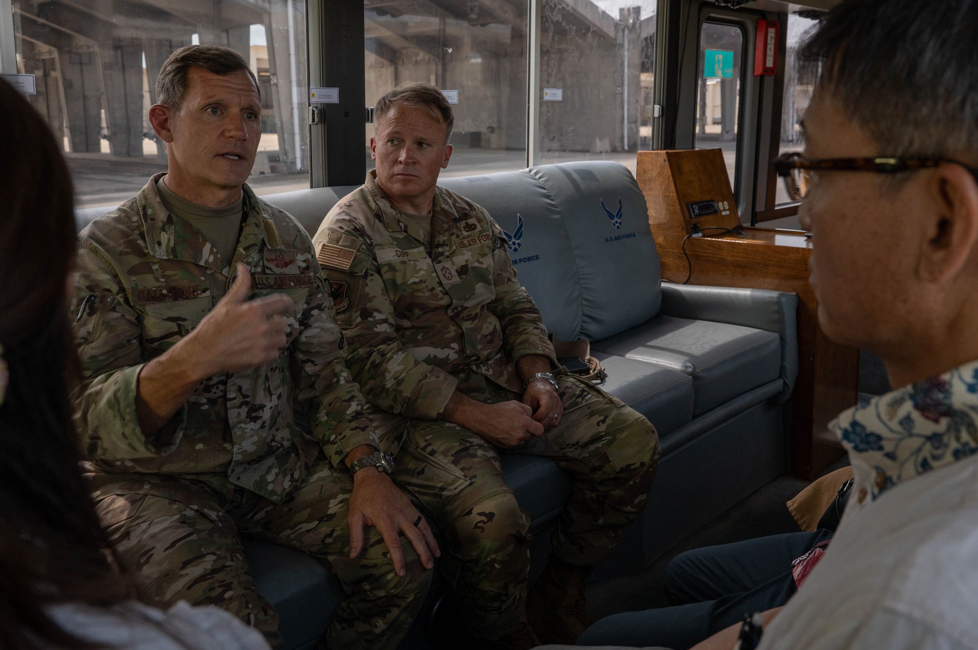 U.S. Air Force Brig. Gen. John Gallemore, 18th Wing commander, and Chief Master Sgt. William Cupp, 18th Wing command chief, brief Mr. Masaru Murai, Okinawa Defense Bureau director general, during a familiarization tour at
Kadena Air Base, Sept. 11, 2025.