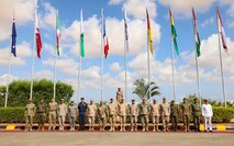 Partner nation military leaders stand together during the Bright Star 25 opening ceremony at Mohamed Naguib Military Base (MNMB), Egypt, Aug. 28, 2025.