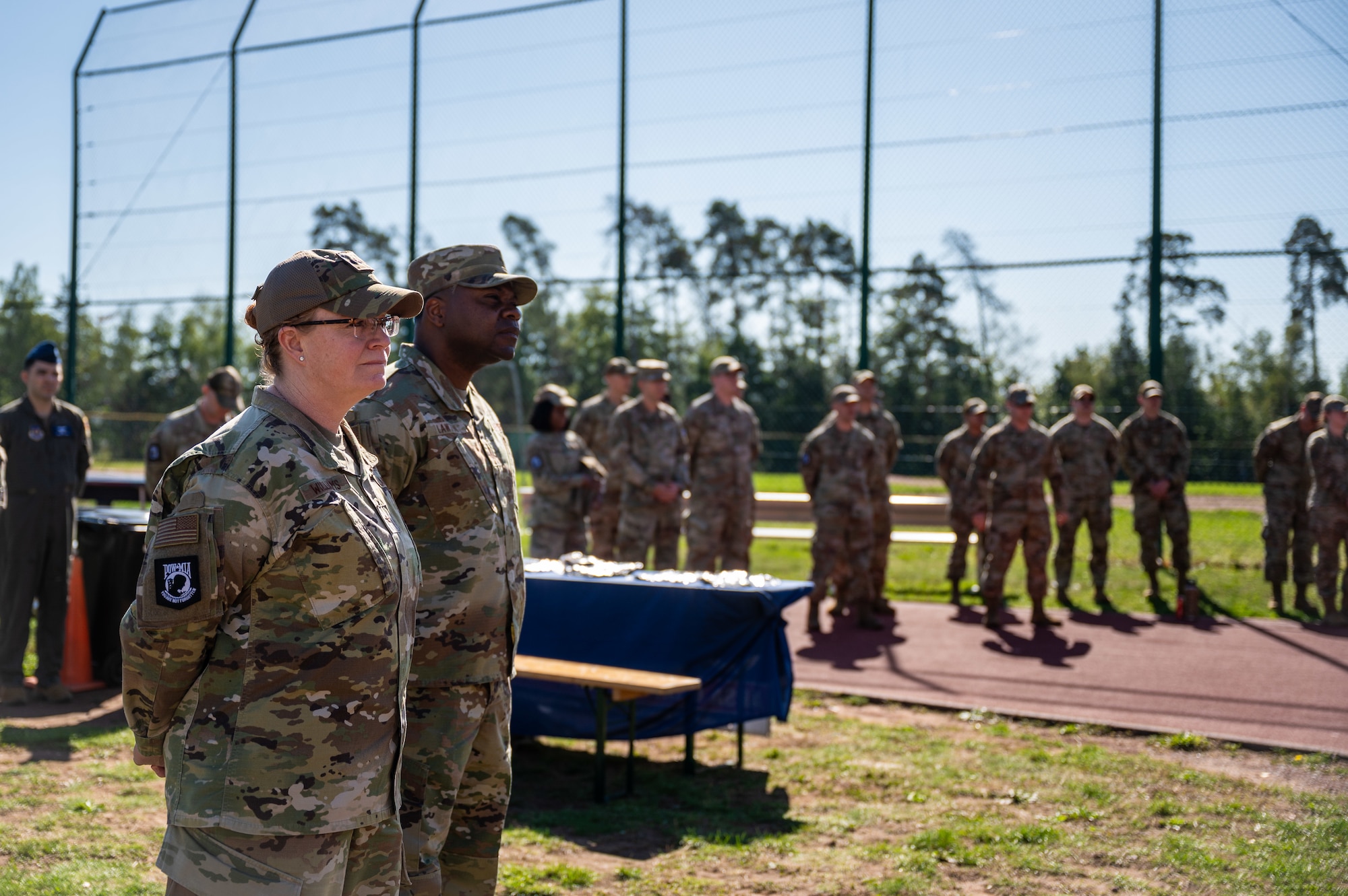 U.S. Air Force Brig. Gen. Adrienne L. Williams, 86th Airlift Wing commander, left, and Chief Master Sgt. Clifford L. Lawton, 86th AW command chief, pause for a moment of silence during a POW/MIA remembrance ceremony