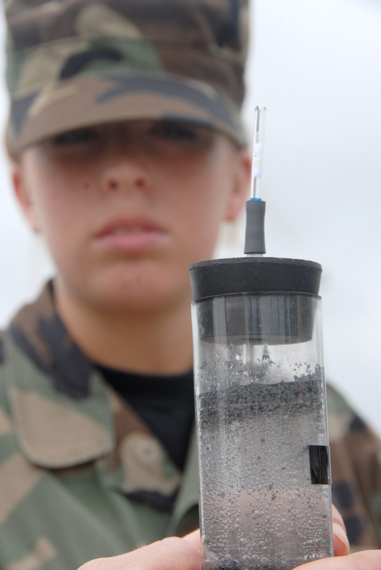 Senior Airman Sarah Rogers of the Kentucky Air National Guard’s 123rd Medical Group tests drinking water at Volk Field, Wis., June 22, 2009, as part of an Operational Readiness Exercise. The event tested the wing’s ability to support homeland defense operations. (U.S. Air National Guard photo by Tech. Sgt. Dennis Flora)