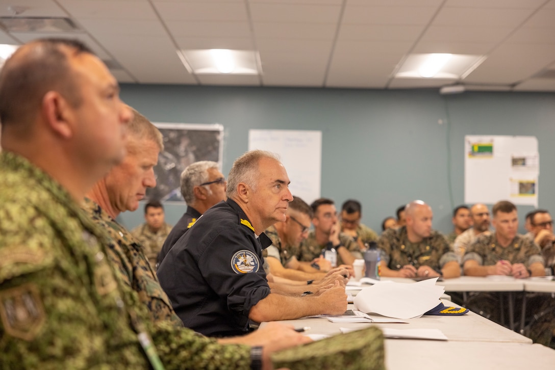Spanish Armada El contraalmirante, Antonio González-Tanago de la Lastra, attends a combined amphibious assault planning brief during exercise UNITAS 2025 at Marine Corps Base Camp Lejeune at North Carolina, Sept. 22, 2025. UNITAS, which is Latin for “unity,” was conceived in 1959 and has taken place annually since first conducted in 1960. This year marks the 66th iteration of the world’s longest running annual multinational maritime exercise. (U.S. Marine Corps photo by Lance Cpl. Payton Goodrich)