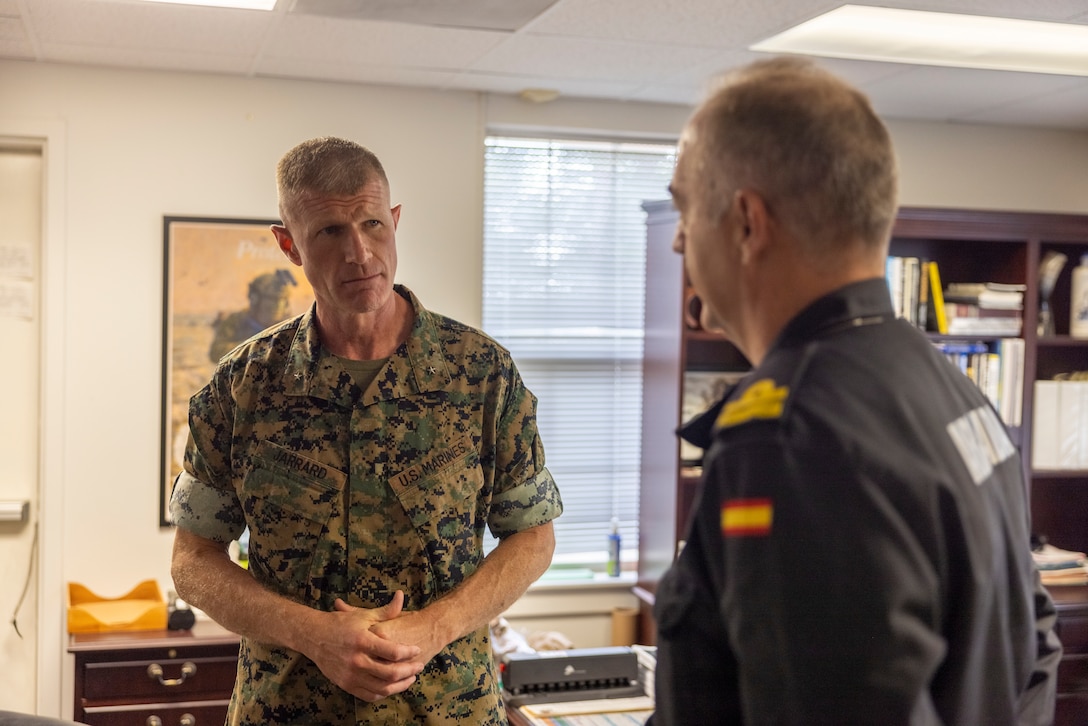 U.S. Marine Corps Brig. Gen. Kevin Jarrard the UNITAS 2025 combined task group commander and commanding general of 4th Marine Division, speaks with Spanish Armada El contraalmirante, Antonio González-Tanago de la Lastra, while visiting the 26th Marine Expeditionary Unit headquarters during exercise UNITAS 2025 at Marine Corps Base Camp Lejeune at North Carolina, Sept. 22, 2025. UNITAS, which is Latin for “unity,” was conceived in 1959 and has taken place annually since first conducted in 1960. This year marks the 66th iteration of the world’s longest running annual multinational maritime exercise. (U.S. Marine Corps photo by Lance Cpl. Payton Goodrich)