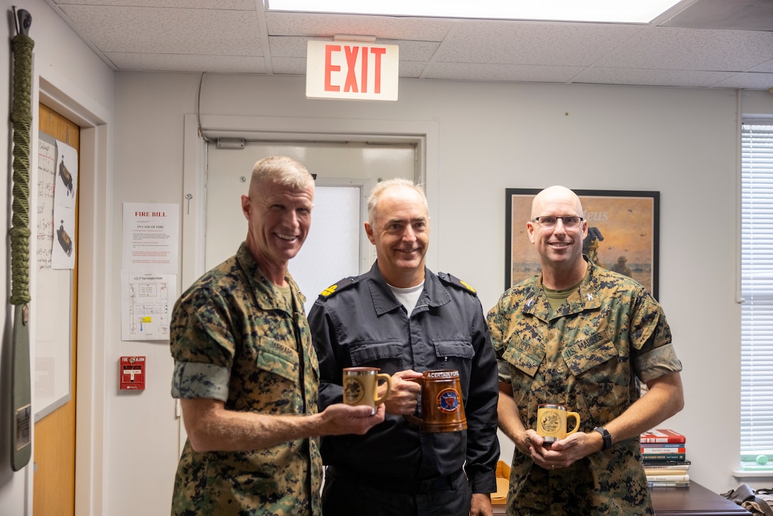 U.S. Marine Corps Brig. Gen. Kevin Jarrard, left, the UNITAS 2025 combined task group commander and commanding general of 4th Marine Division, U.S. Marine Corps Col. Ben Reid, right, the commanding officer of the 26th Marine Expeditionary Unit,  and Spanish Armada El contraalmirante, Antonio González-Tanago de la Lastra pose for a photo while on a visit to the 26th Marine Expeditionary Unit headquarters during exercise UNITAS 2025 at Marine Corps Base Camp Lejeune at North Carolina, Sept. 22, 2025. UNITAS, which is Latin for “unity,” was conceived in 1959 and has taken place annually since first conducted in 1960. This year marks the 66th iteration of the world’s longest running annual multinational maritime exercise. (U.S. Marine Corps photo by Lance Cpl. Payton Goodrich)
