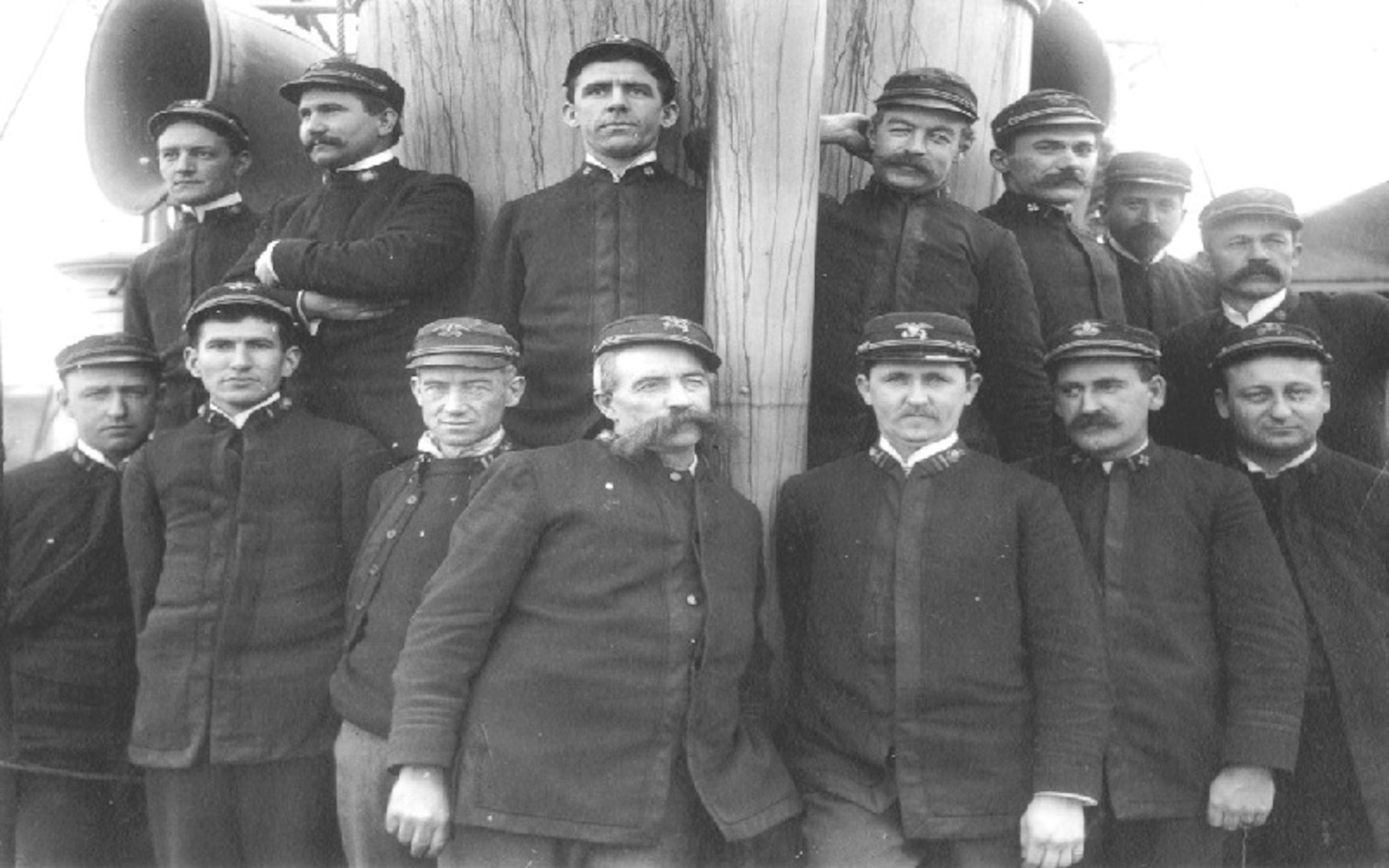 Officers of the Revenue Cutter Bear pose for a group photo with Samuel Call standing in the back row far right. (U.S. Coast Guard)