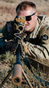 Soldiers with the 34th Infantry Division receive instruction on the M250 automatic rifle during a New Equipment Training fielding at Camp Ripley, Minn., September 15, 2025.