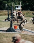 A Soldier with the Minnesota National Guard’s 34th Infantry Division prepares to fire the M250 automatic rifle during a New Equipment Training fielding at Camp Ripley, Minn., September 16, 2025.