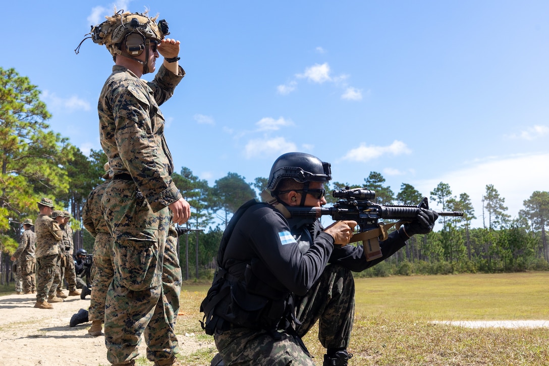 Marines with Infanteria de Marina Fuerza Naval de Honduras (Honduran marine infantry) participate in a live course of fire during a multinational marksmanship range as part of exercise UNITAS 2025 at Marine Corps Base Camp Lejeune, North Carolina, Sept. 23, 2025. UNITAS, which is Latin for “unity,” was conceived in 1959 and has taken place annually since first conducted in 1960. This marks the 66th iteration of the world’s longest running annual multinational maritime exercise. (U.S. Marine Corps photo by Lance Cpl. Jack Labrador)