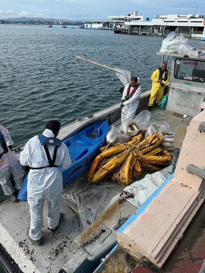 Coast Guard Incident Management Division personnel and Oil Spill Response Organization contractors conclude response efforts to secure two legacy pipe structures between piers 2 and 3 in San Juan Habor, Sept. 25, 2025.  Efforts concluded following operations by oil spill removal organization contractors to seal two legacy pipes to prevent any further discharge of oil into San Juan Harbor, followed by approximately three weeks of site monitoring with no signs of pollution in the water. (U.S. Coast Guard photo)