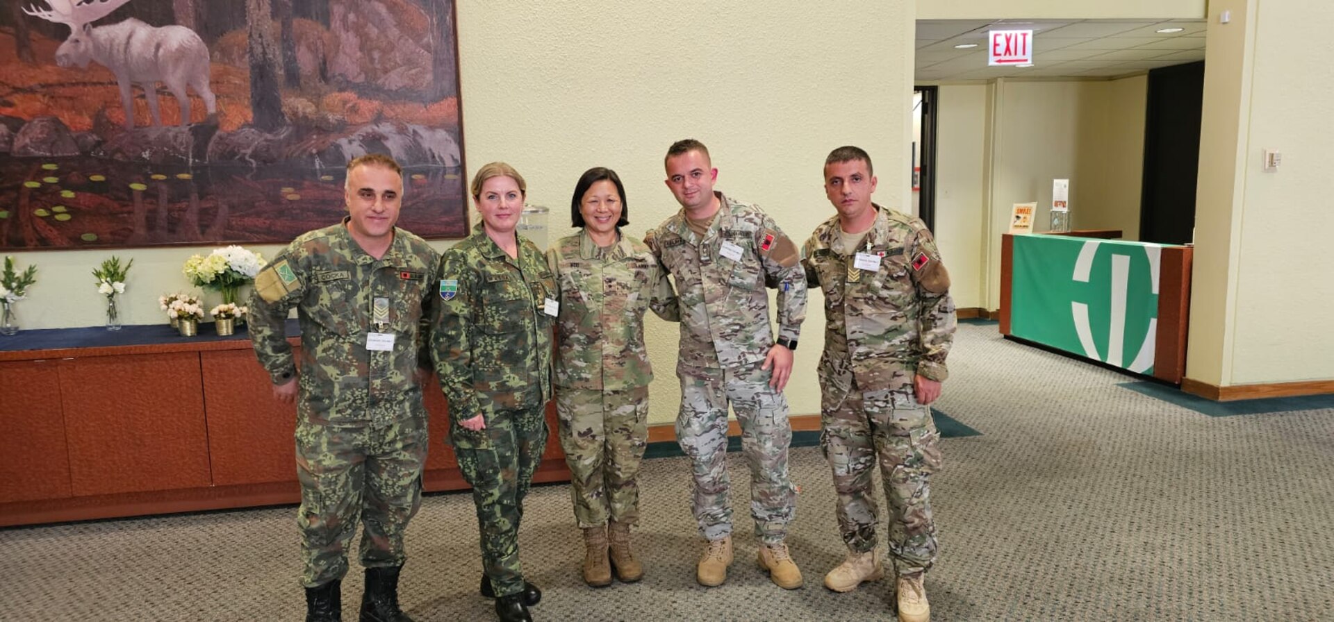 Medical personnel from the Albanian Armed Forces meet with U.S. Army Maj. Gen. Lisa J. Hou, D.O., director of the National Guard Bureau Office of the Joint Surgeon General, during the Rush International Advanced Trauma Training Course and Medical Exchange Event in Chicago, Sept. 12, 2025.