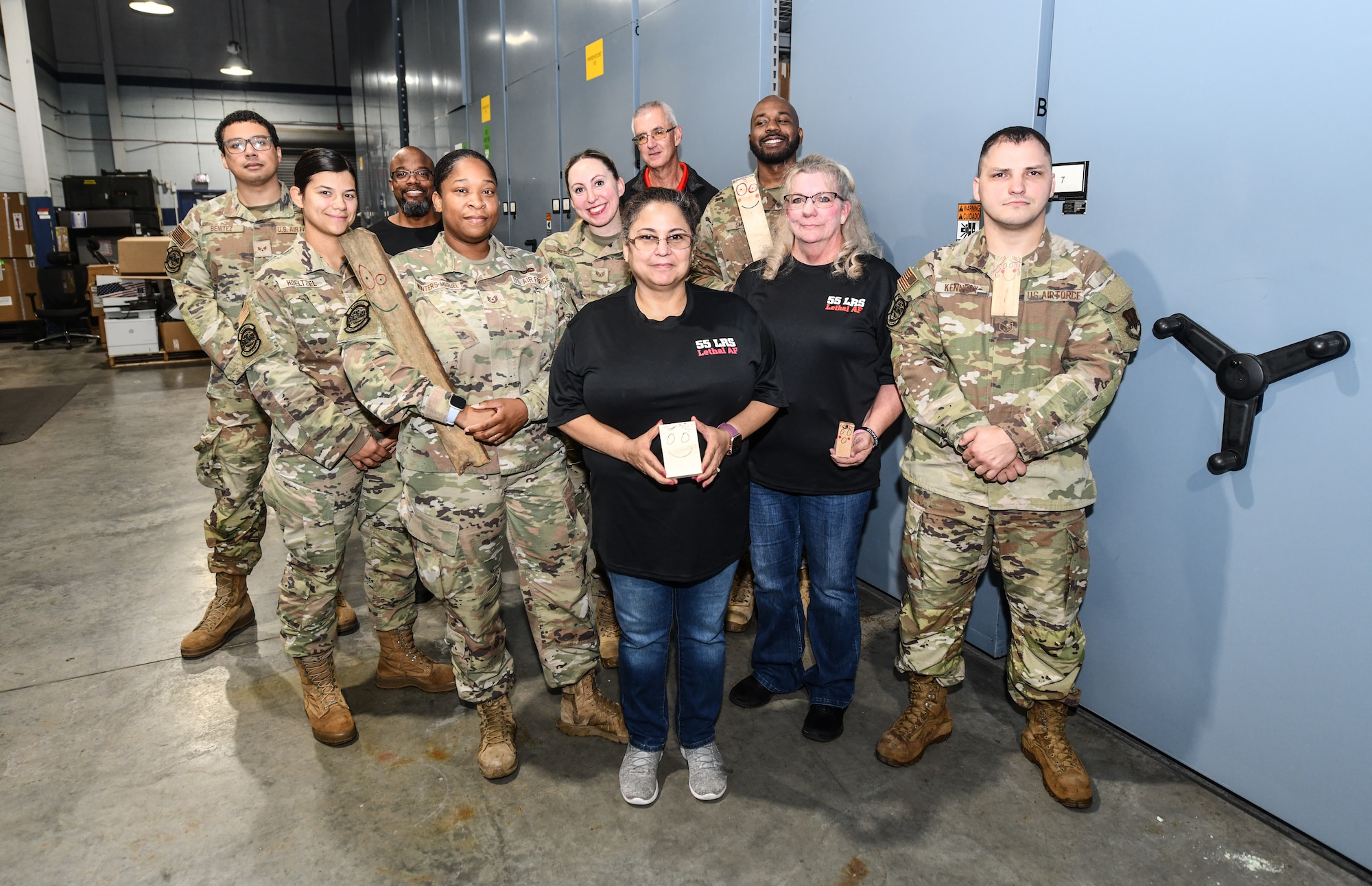 The 55th Logistics Readiness Squadron's Customer Support Team poses for a photo at Offutt Air Force Base, September 23. The 55th LRS completed a one hundred percent accountability of all equipment and vehicles in preparation for the Department of Defense's Financial Improvement and Audit Readiness inspection. (U.S. Air Force photo by Chad Watkins)