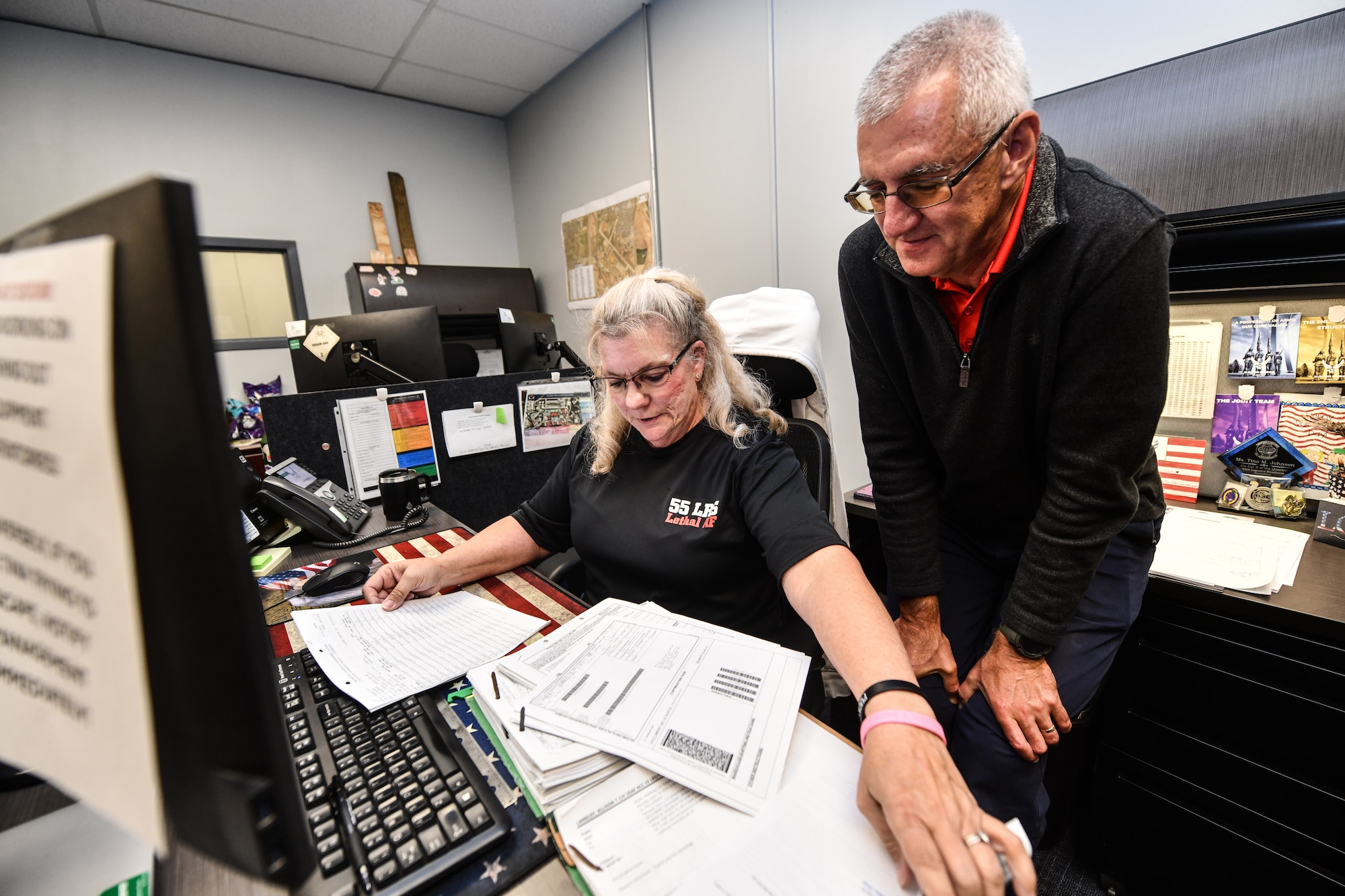 Tina Johnson, 55th Logistics Readiness Squadron customer support superintendent, and Dave Eads, 55th LRS quality assurance program manager, validate asset listings with documentation at Offutt Air Force Base, September 23. The 55th LRS completed a one hundred percent accountability of all equipment and vehicles in preparation for the Department of Defense's Financial Improvement and Audit Readiness inspection. (U.S. Air Force photo by Chad Watkins)