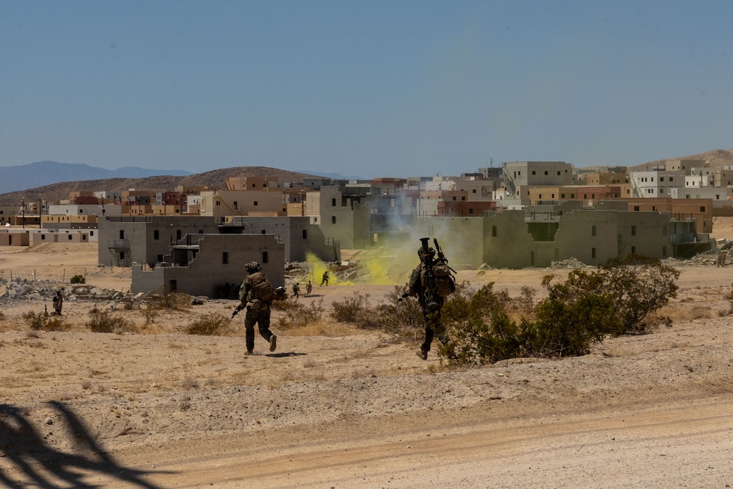 U.S. Marines with 2nd Battalion, 5th Marine Regiment, 1st Marine Division, conduct movement to range 220 during an Adversary Force Exercise at Marine Corps Air Ground Combat Center, Twentynine Palms, California, August 8, 2025.  AFX creates a credible, realistic threat for the exercise forces participating in Service Level Training Exercise 4-25 to engage against during the upcoming Marine Air Ground Task Force Warfighting Exercise in a force-on-force, unscripted wargame. (U.S. Marine Corps photo by Lance Cpl. Jozef P. Majewski)