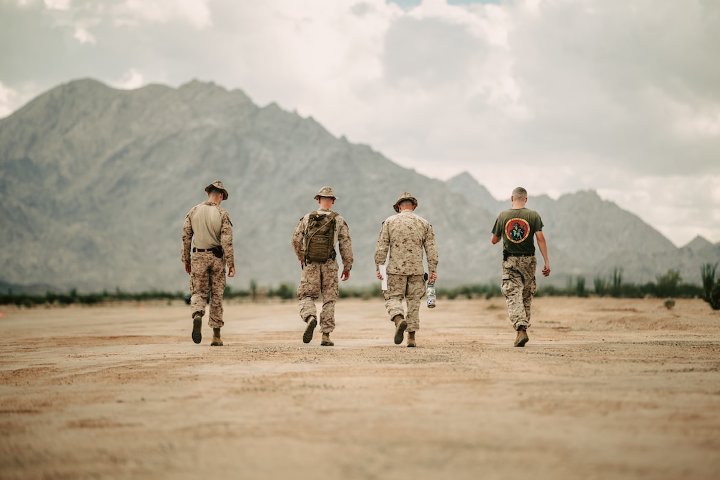 U.S. Marines assigned to Marine Aviation Weapons and Tactics Squadron One (MAWTS-1) conduct a survey of an assault landing zone during Weapons and Tactics Instructor course 1-26 at Landing Zone Hawkeye, near Wellton, Arizona, Sept. 18, 2025. WTI is a seven-week training event hosted by MAWTS-1 which emphasizes operational integration of the six functions of Marine aviation in support of the Marine Air Ground Task Force, Joint and Coalition Forces. (U.S. Marine Corps photo by Lance Cpl. Micah Thompson)