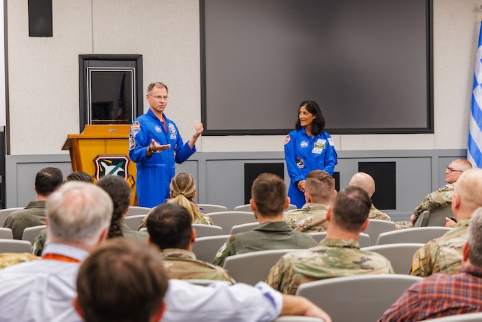 Space Force Guardian and NASA Astronaut Brig. Gen. Nick Hague and NASA Astronaut and retired Navy Capt. Williams speaks with Guardians and Airmen at the U.S. Air Force Test Pilot School. (U.S. Space Force photo by Lindsey Iniguez)