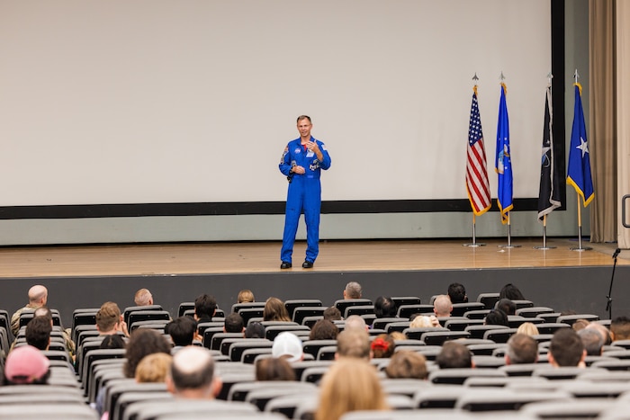 Space Force Guardian and NASA Astronaut Brig. Gen. Nick Hague speaks with Airmen, Guardians and families during a base-wide presentation where he spoke about his experiences at the International Space Station. (Photo by Lindsey Iniguez)