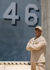 250731-N-YU102-1024 NORFOLK, Va. (July 31, 2025)—  Lt. Cmdr. Duane Hardy, a chaplain assigned to the Whidbey Island-class dock landing ship USS Tortuga (LSD 46), poses for a photograph in front of the Tortuga, July 31. This is Hardy’s second time being stationed on the Tortuga, the first being over 30 years ago as a personnelman. (U.S. Navy photo by Mass Communication Specialist 2nd Class Luke Wilson)