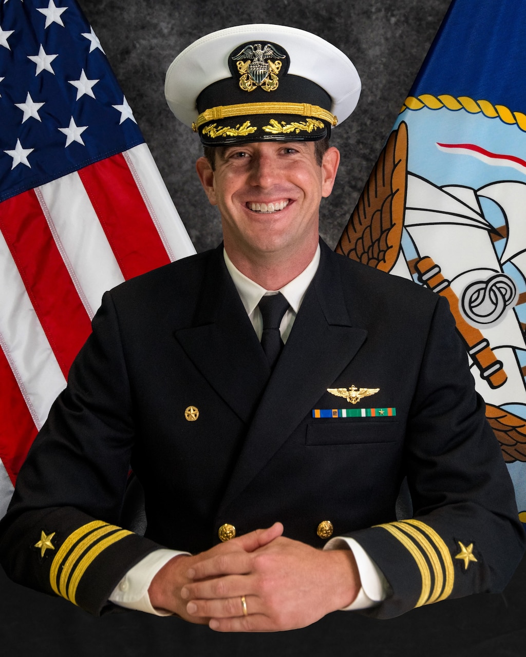 Cmdr. William E. Dann Takes Command of VFA-103