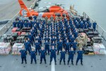 U.S. Coast Guard Cutter Midgett (WMSL 757) crewmembers offload bales of seized narcotics in San Diego, Sept. 25, 2025. The drugs, worth an estimated $156 million, were seized in international waters of the Eastern Pacific Ocean.