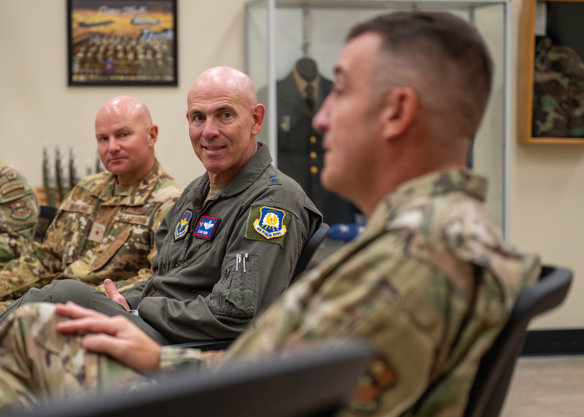 U.S. Air Force Maj. Gen. Clark Quinn (center), Air Education and Training Command deputy commander, engages in conversation with Luke leadership during a briefing about the Luke Air Force Base Airman Leadership School, on Sept. 16, 2025, at Luke AFB, Arizona.