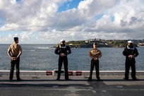 250614-N-DB724-1154 SYDNEY (June 14, 2025) Sailors assigned to the forward-deployed amphibious assault ship USS America (LHA 6), and U.S. Marines assigned to the 31st Marine Expeditionary Unit (MEU), man the rails on the ship’s flight deck, while arriving in Sydney, June 14. America, lead ship of the America Amphibious Ready Group, is operating in the U.S. 7th Fleet area of operations. U.S. 7th Fleet is the U.S. Navy’s largest forward-deployed numbered fleet, and routinely interacts and operates with allies and partners in preserving a free and open Indo-Pacific region. (U.S. Navy photo by Mass Communication Specialist 1st Class Jomark A. Almazan)