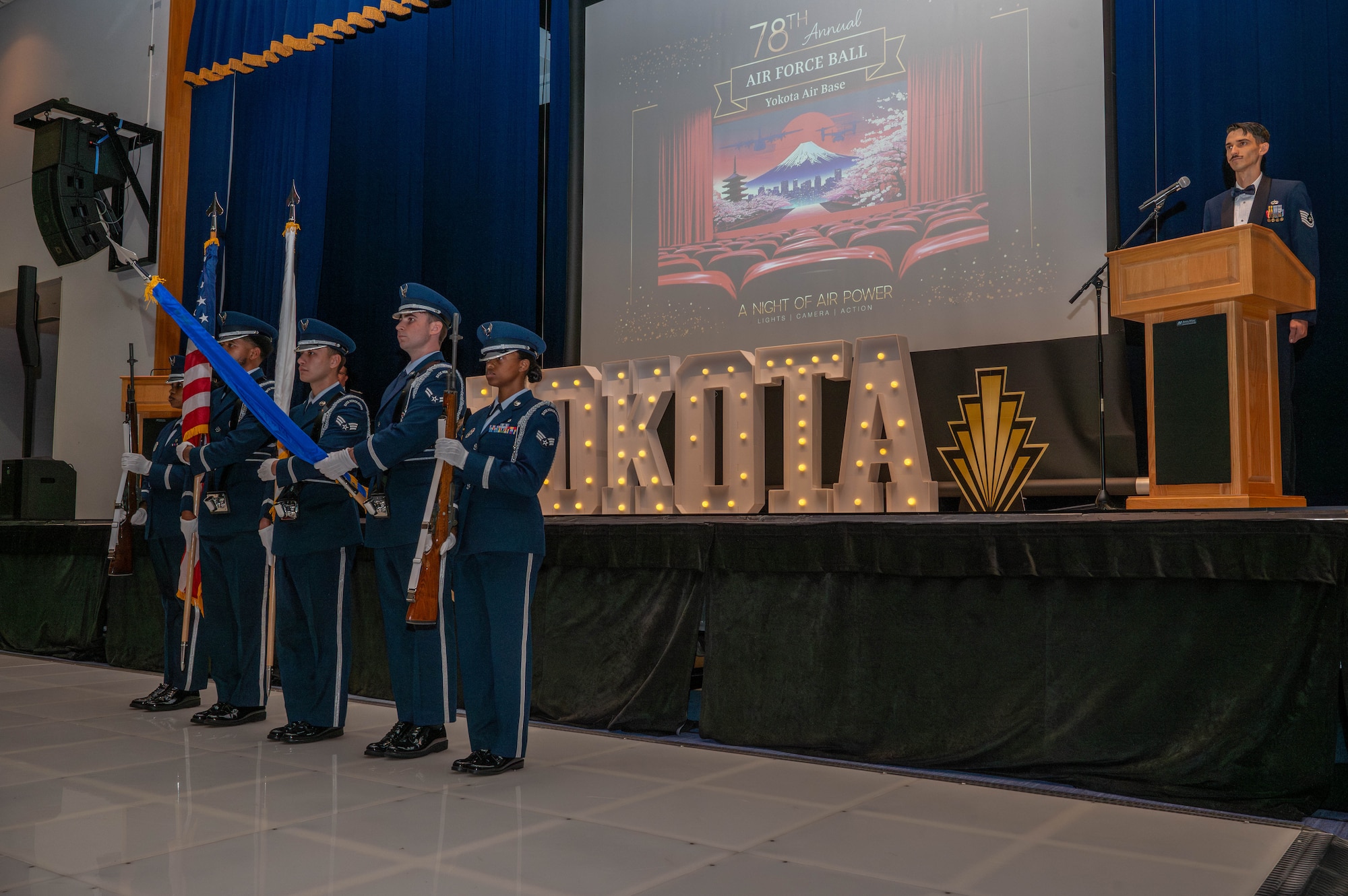 The Yokota Air Base Honor Guard posts the colors.