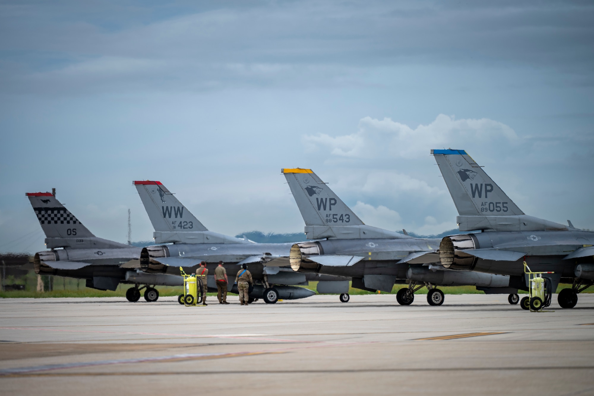 U.S. Air Force F-16 Fighting Falcons assigned to the 36th Fighter Squadron standby on the flightline before take off at Osan Air Base, Republic of Korea, Sept. 18, 2025.