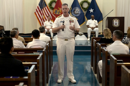 OKINAWA, Japan (April 18, 2025) Rear Adm. Chris Stone, the outgoing commander of Commander, Task Force (CTF) 76, gives remarks during a change-of-command ceremony at Camp Courtney Chapel in Okinawa, Japan, April 18, 2025. Within the U.S. 7th Fleet area of operations, CTF-76 is responsible for conducting expeditionary warfare operations with Navy and Marine Corps capabilities to support a range of theater contingencies, ranging from humanitarian assistance and disaster response to full combat operations. (U.S. Marine Corps photo by Lance Cpl. Alexander Canal) 250418-M-SJ698-1011