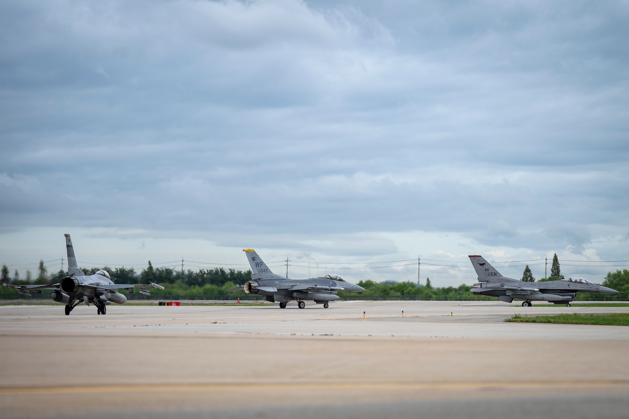 U.S. Air Force F-16 Fighting Falcons assigned to the 36th Fighter Squadron taxi at Osan Air Base, Republic of Korea, Sept. 18, 2025.