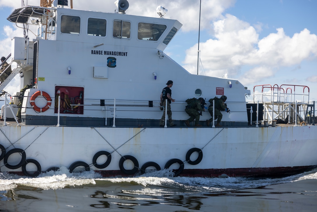 Marines with Infantería de Marina Colombiana (Colombian marine corps) clear a ship while conducting visit, board, search and seizure training during exercise UNITAS 2025 Marine Corps Air Station Cherry Point, North Carolina, Sept. 23, 2025. UNITAS, which is Latin for “unity,” was conceived in 1959 and has taken place annually since first conducted in 1960. This year marks the 66th iteration of the world’s longest running annual multinational maritime exercise. (U.S. Marine Corps photo by Lance Cpl. Payton Goodrich)