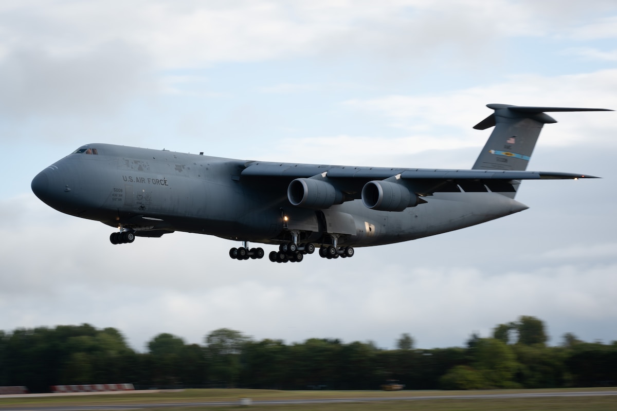 A U.S. Air Force C-5M Super Galaxy lands at RAF Fairford, United Kingdom, Sept. 10, 2025. The aircraft transported U.S. Air Force Reserve Airmen, equipment and mission-essential cargo in support of exercise Cobra Warrior 25.2, a large-scale multinational exercise focused on combined training and interoperability. (U.S. Air Force photo by Airman 1st Class Adam Enbal)